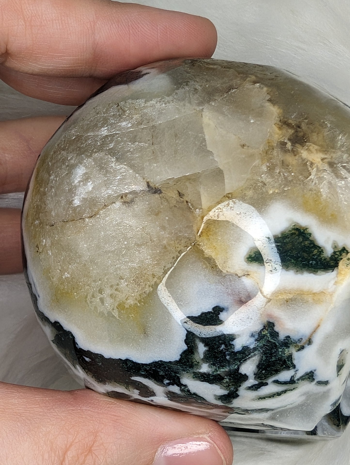 Imperfect Moss Agate w/ Calcite Skull Carving