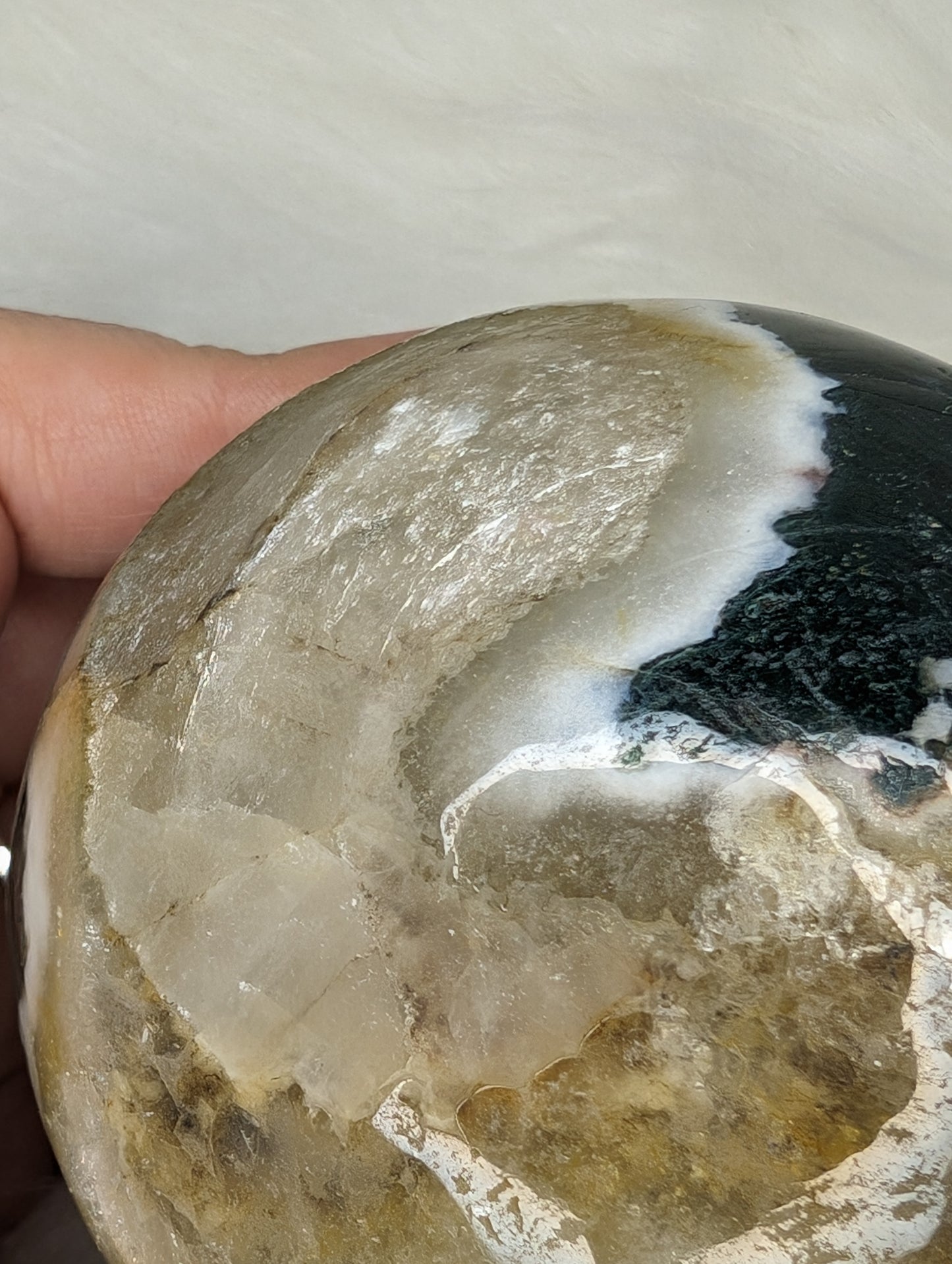 Imperfect Moss Agate w/ Calcite Skull Carving